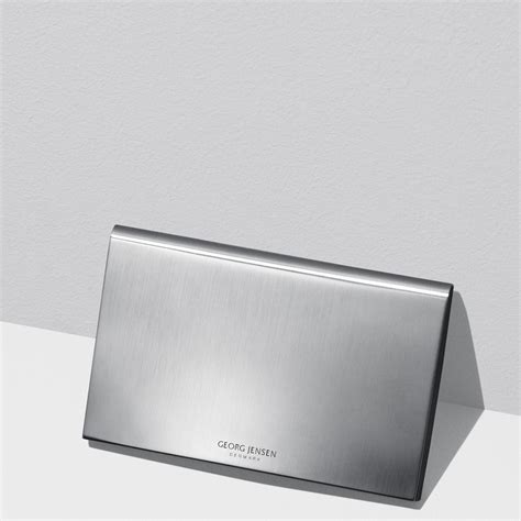 KONNO cardholder in matte finish stainless steel .